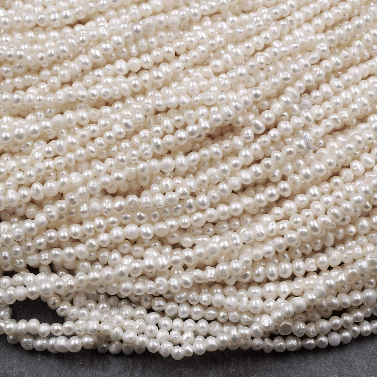 WHOLESALE 2 mm Tiny Seed Pearl Beads Baby Pink Color Small Potato Fres –  QualityBeadMart