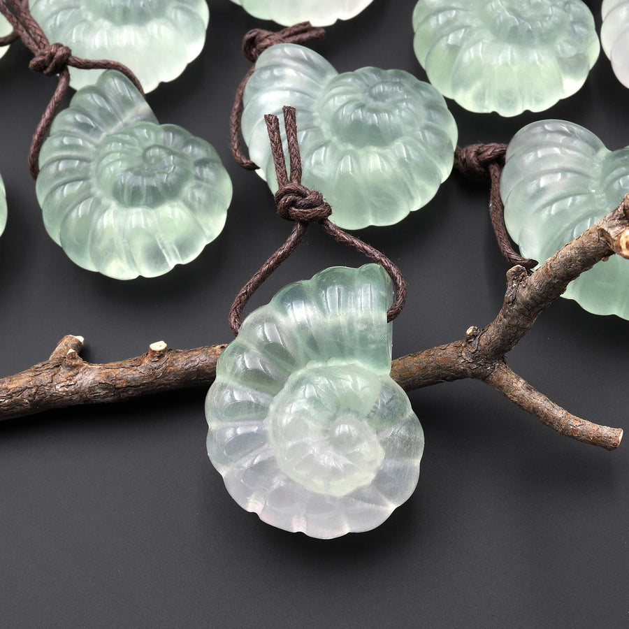 AAA Hand Carved Natural Candy Fluorite Light Green Ammonite Pendant A3