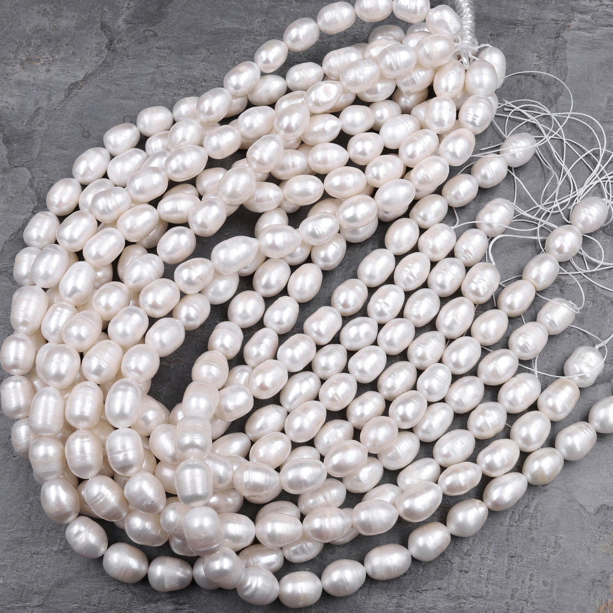 Gorgeous Oval Near Round White Freshwater Pearl Beads with Small
