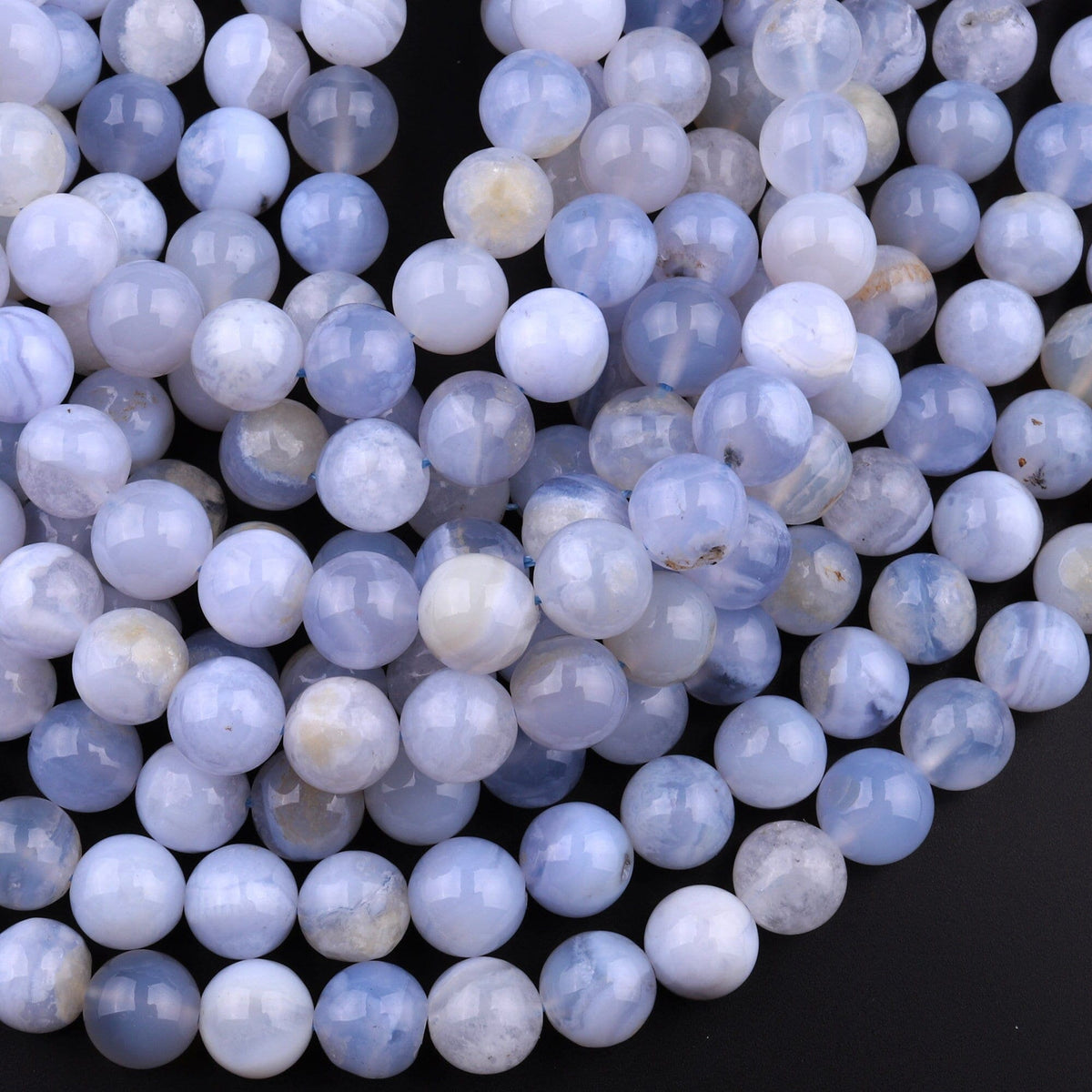 Blue Lace Agate Gemstone Beads. 12mm round beads on 15 inch strand. Full strand popular of A/AA grade beads, about 38 per strand. Blue Chalcedony