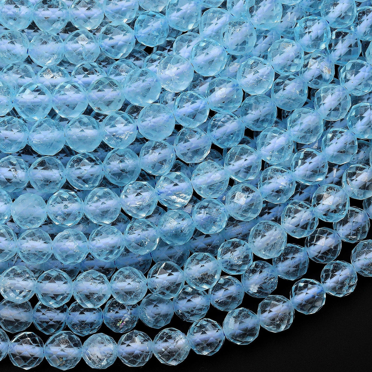 2024 18 Inch Swiss Blue Topaz Faceted Roundel 5-10MM , Top Quality, Swiss Blue topaz faceted Beads. Listing of single strand