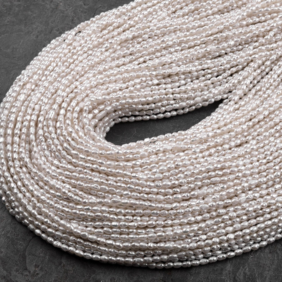 Tiny Small Genuine Freshwater Rice Seed Pearls 2x3mm White Oval Pearl 15" Strand