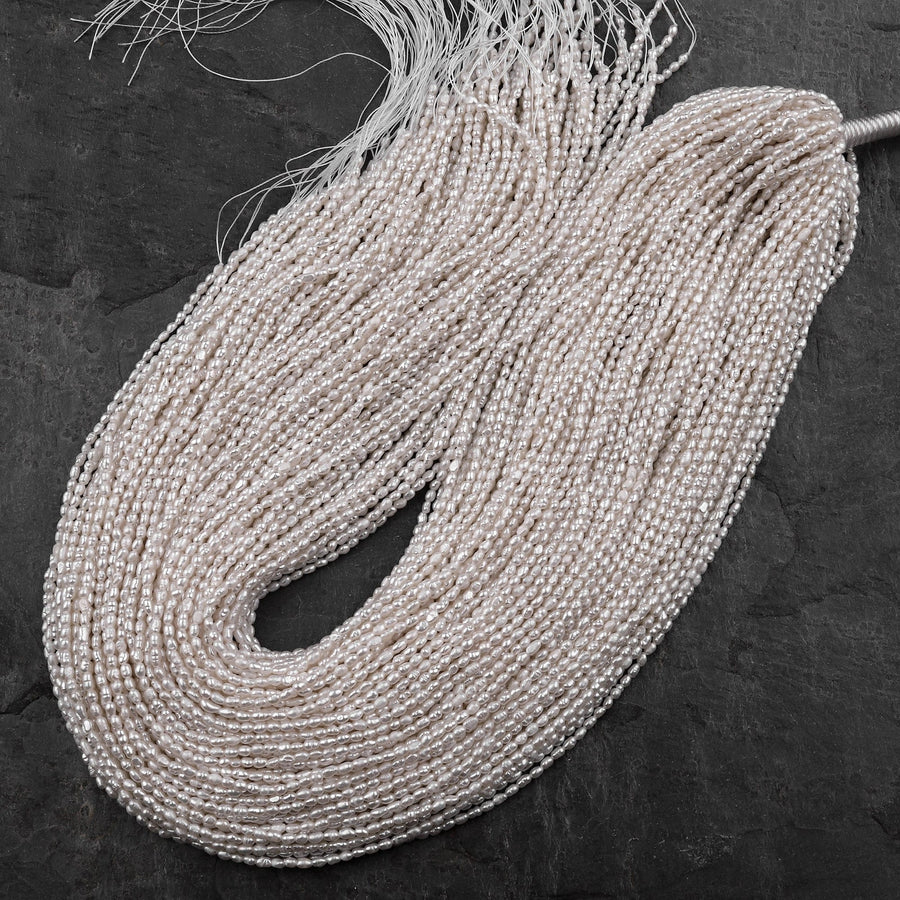 Tiny Small Genuine Freshwater Rice Seed Pearls 2x3mm White Oval Pearl 15" Strand