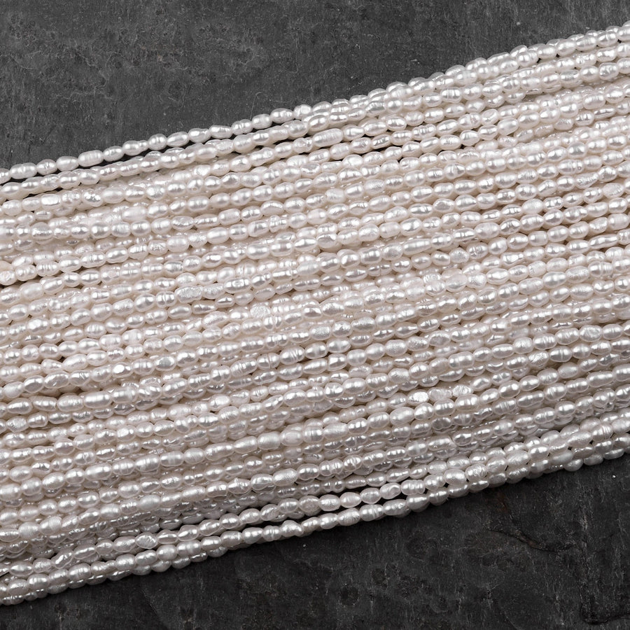 Tiny Small Genuine Freshwater Rice Seed Pearls 2x3mm White Oval Pearl 15" Strand