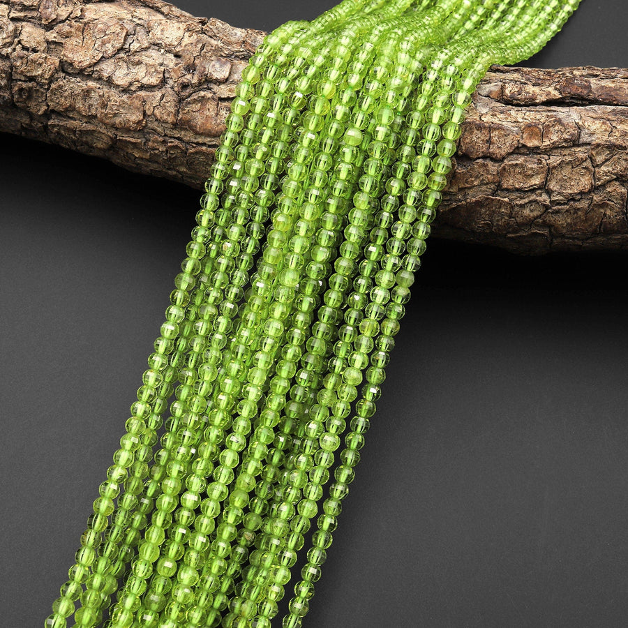 AAA+ Natural Green Peridot 4mm Faceted Lantern Round Beads 15.5" Strand