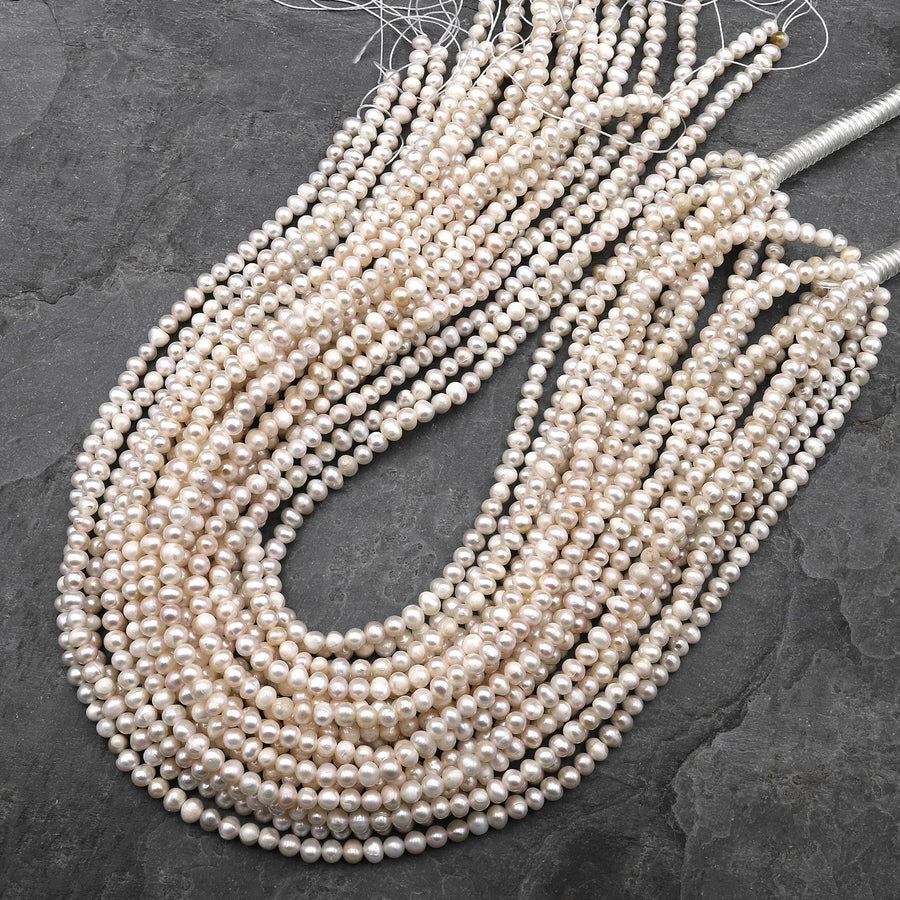 Genuine White Freshwater Pearl 5mm Off Round Pearl 15.5" Strand