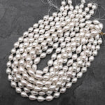 AAA Large Natural White Teardrop Pearl Good For Earrings Vertically Drilled 15.5" Strand