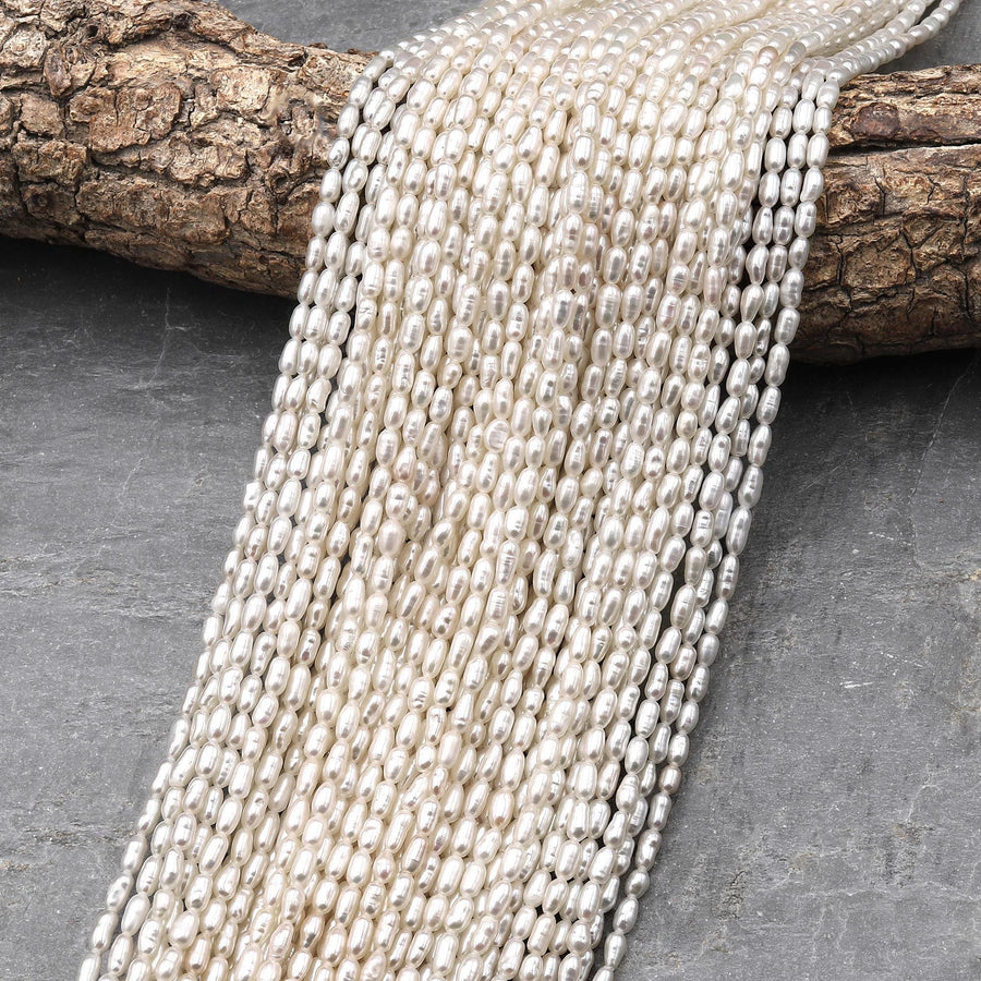 AAA Genuine Freshwater Small Rice Seed Pearls White Oval Pearl 15.5" Strand