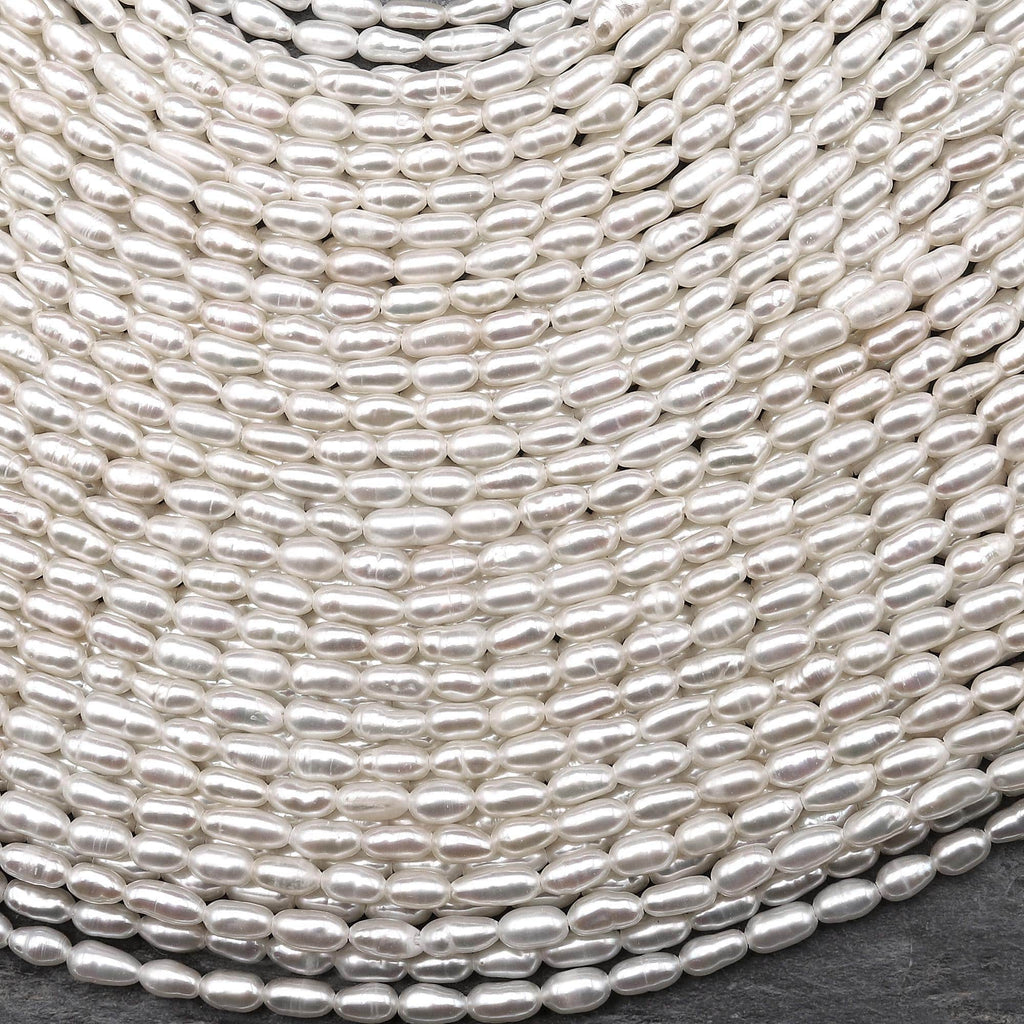 AAA Genuine Freshwater Small Rice Seed Pearls White Oval Pearl 15.5" Strand