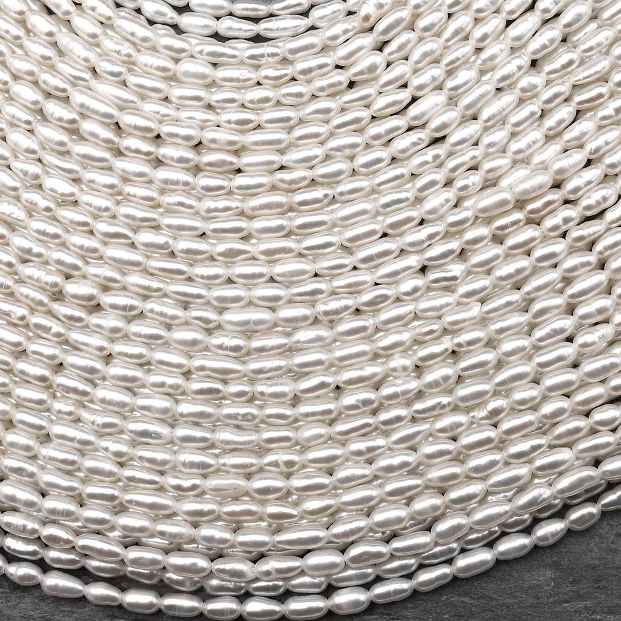 AAA Genuine Freshwater Small Rice Seed Pearls White Oval Pearl 15.5" Strand