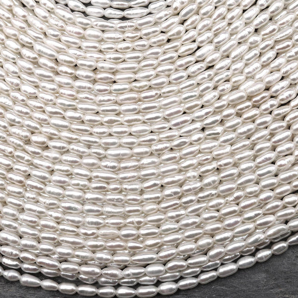 AAA Genuine Freshwater Small Rice Seed Pearls White Oval Pearl 15.5" Strand