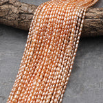 AAA Small Genuine Freshwater Natural Metallic Peach Apricot Pearl Oval Rice Shape Iridescent High Luster Pearl 15.5" Strand