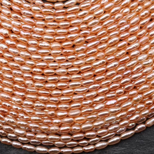 AAA Small Genuine Freshwater Natural Metallic Peach Apricot Pearl Oval Rice Shape Iridescent High Luster Pearl 15.5" Strand