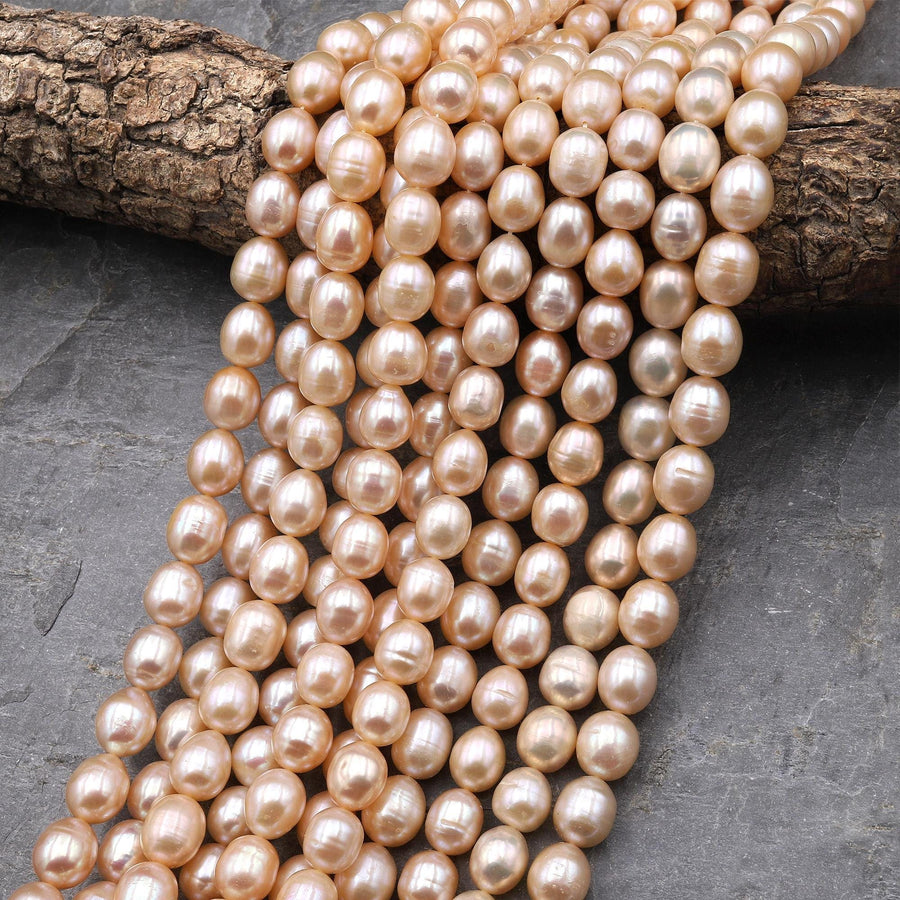 AAA Genuine Natural Freshwater Golden Peach Apricot Potato Oval Pearl Iridescent Luster 15.5" Strand