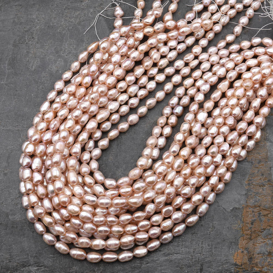 Genuine Natural Freshwater Pink Potato Oval Nugget Pearl 15.5" Strand