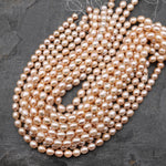 AAA Genuine Natural Freshwater Golden Peach Apricot Potato Oval Pearl Iridescent Luster 15.5" Strand