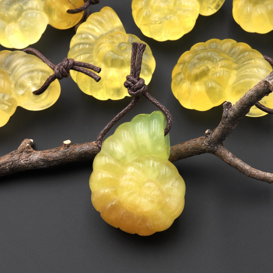 AAA Hand Carved Natural Candy Fluorite Yellow Ammonite Pendant