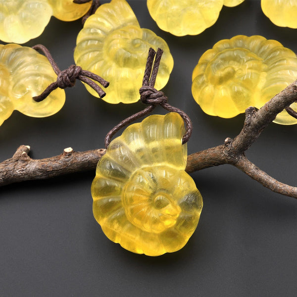 AAA Hand Carved Natural Candy Fluorite Yellow Ammonite Pendant A1
