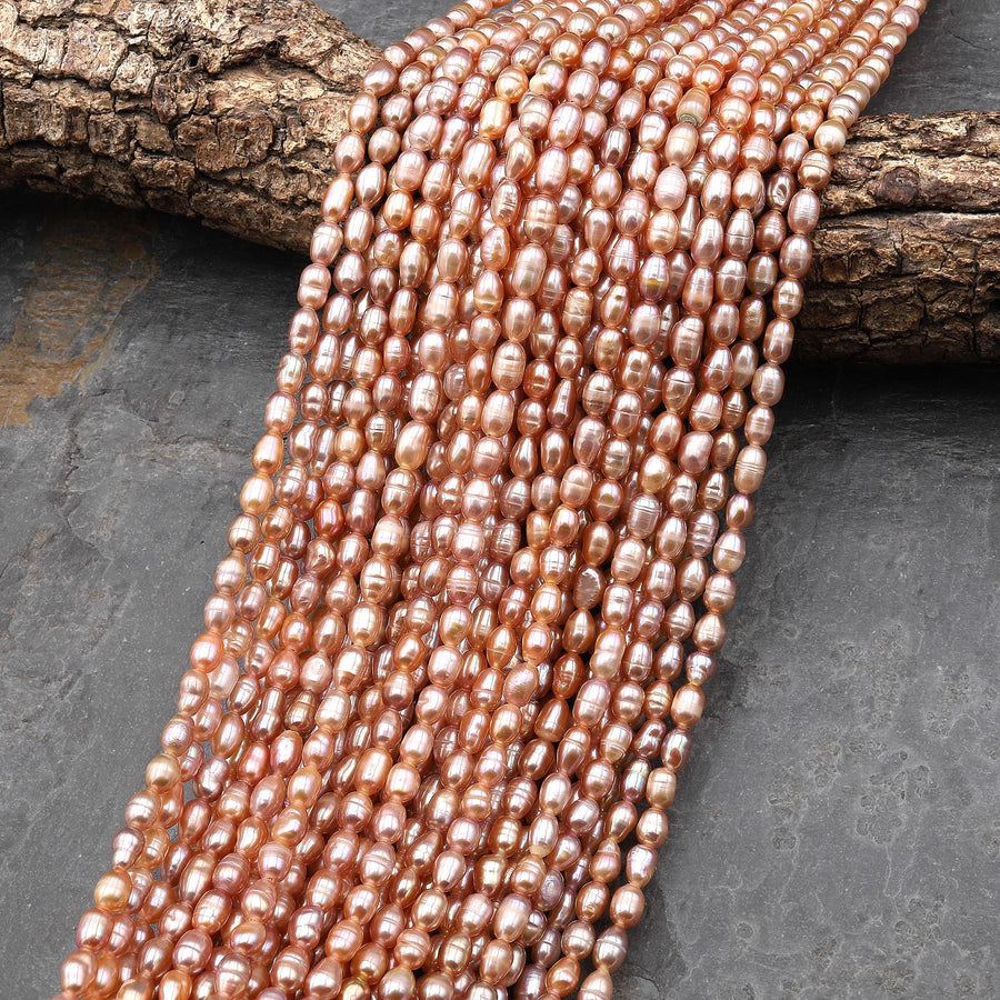 Genuine Freshwater Natural Metallic Mauve Pink Golden Peach Pearl Oval Rice Shape Iridescent High Luster Pearl 14" Strand