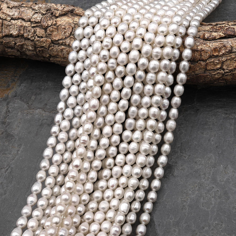 Genuine White Freshwater Oval 6mm 7mm Pearl Shimmery Iridescent Classic White Pearl 14" Strand