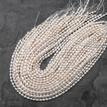 Genuine White Freshwater Potato Oval Rice 6x4mm Pearl Shimmery Iridescent Classic White Pearl 14" Strand