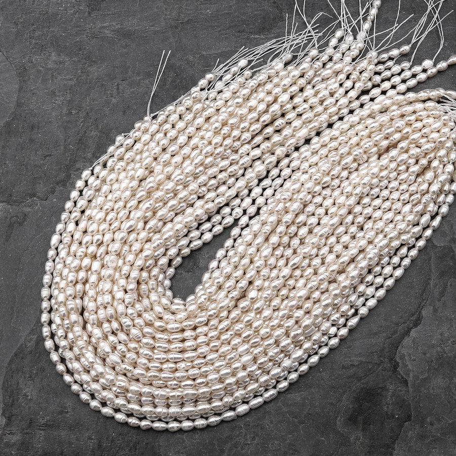 Genuine White Freshwater Potato Oval Rice 6x4mm Pearl Shimmery Iridescent Classic White Pearl 14" Strand