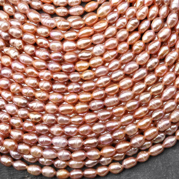 Genuine Freshwater Natural Metallic Mauve Pink Golden Peach Pearl Oval Rice Shape Iridescent High Luster Pearl 14" Strand