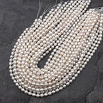 Genuine White Freshwater Oval 6mm 7mm Pearl Shimmery Iridescent Classic White Pearl 14" Strand