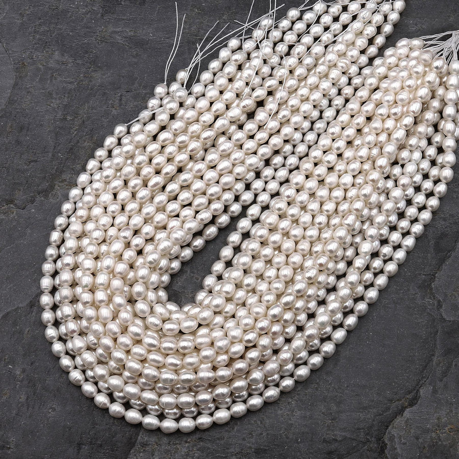 Genuine White Freshwater Oval 6mm 7mm Pearl Shimmery Iridescent Classic White Pearl 14" Strand