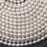 Genuine White Freshwater Oval 6mm 7mm Pearl Shimmery Iridescent Classic White Pearl 14" Strand