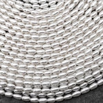 AAA Genuine Freshwater White Oval Rice Smooth Pearls 15.5" Strand