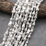 AAA High Luster Genuine White Freshwater Baroque Flame Ball Ming Pearl 16.5" Strand