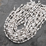 AAA High Luster Genuine White Freshwater Baroque Flame Ball Ming Pearl 16.5" Strand