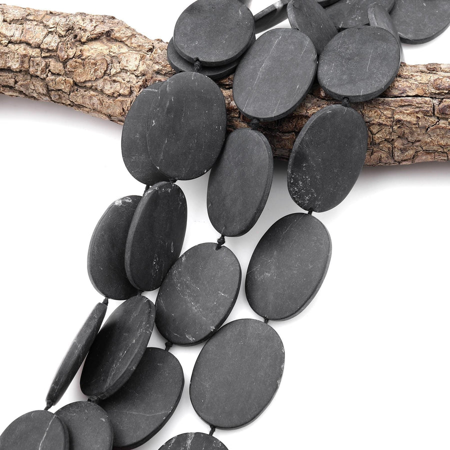 Large Hand Cut Matte Natural Brazilian Black Stone Oval Beads Gemstone 15.5" Strand