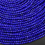 May include: Close-up view of numerous faceted lapis lazuli beads.  The beads are a deep, rich blue color and are uniformly sized and shaped.  They are arranged in parallel rows, creating a dense, textured pattern. The image showcases the vibrant color and faceted surfaces of the gemstone beads, ideal for jewelry making or crafting projects.  These faceted beads are perfect for creating necklaces, bracelets, earrings, and other jewelry items.