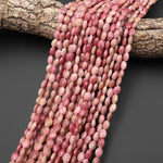 Faceted Natural Pink Petrified Rhodonite Oval Gemstone Beads 6x8mm 15.5" Strand