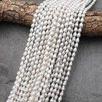 Natural White Teardrop Pearl Good For Earrings Vertically Drilled 14.5" Strand