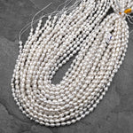 Natural White Teardrop Pearl Good For Earrings Vertically Drilled 14.5" Strand