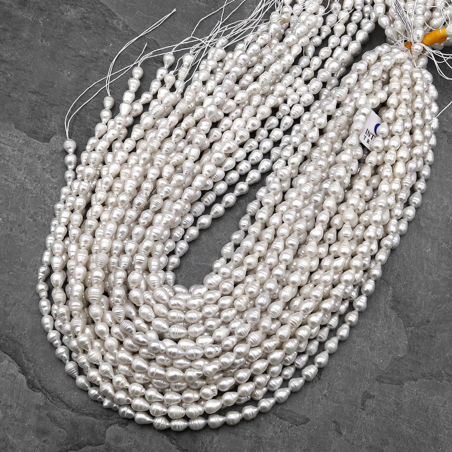 Natural White Teardrop Pearl Good For Earrings Vertically Drilled 14.5" Strand