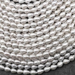 Natural White Teardrop Pearl Good For Earrings Vertically Drilled 14.5" Strand