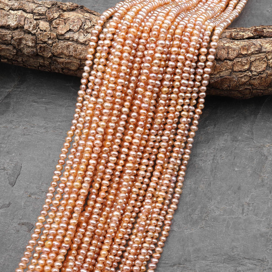 AAA Natural Iridescent Apricot Peach Center Drilled Potato Rondelle 4mm Pearl 15.5" Strand