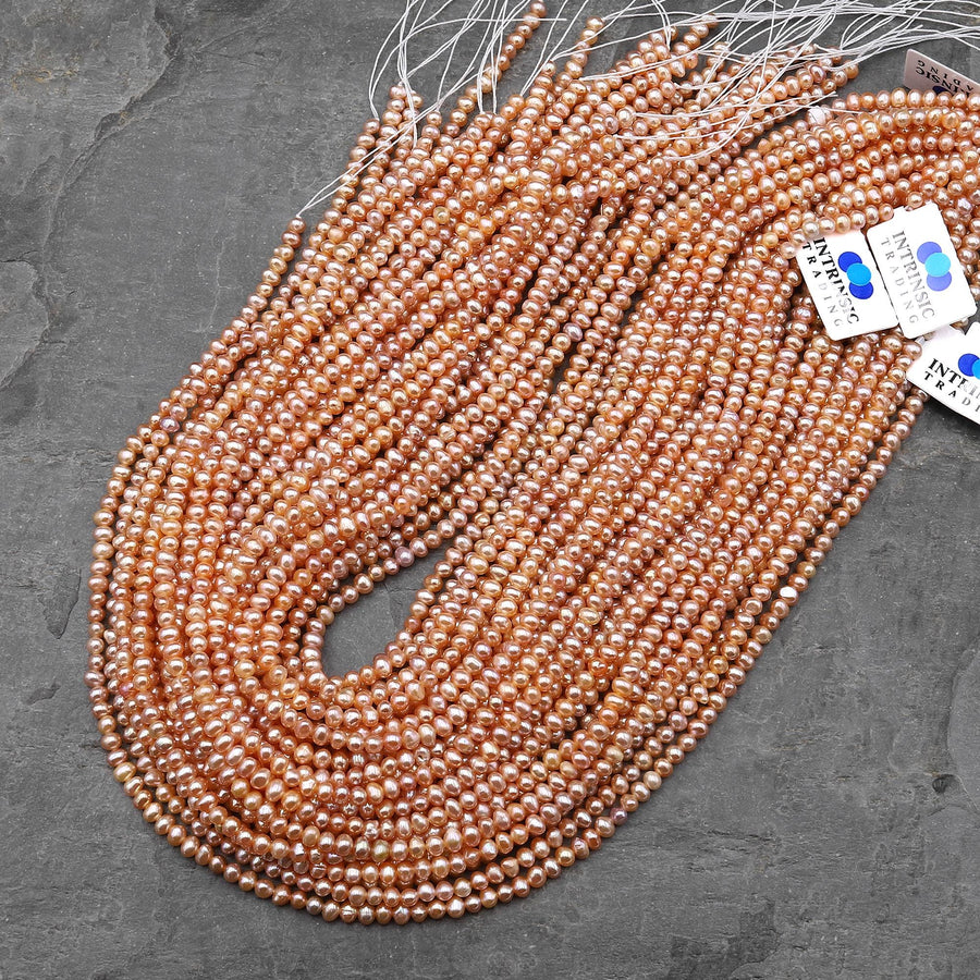 AAA Natural Iridescent Apricot Peach Center Drilled Potato Rondelle 4mm Pearl 15.5" Strand