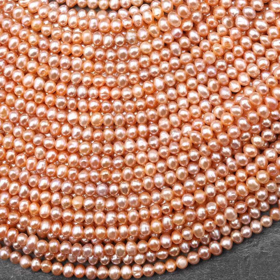 AAA Natural Iridescent Apricot Peach Center Drilled Potato Rondelle 4mm Pearl 15.5" Strand