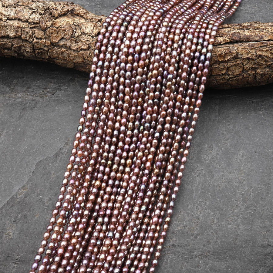 AAA Genuine Natural Metallic Mauve Pink Purple Oval Rice Freshwater Pearl Iridescent High Luster 3x4mm 14.5" Strand