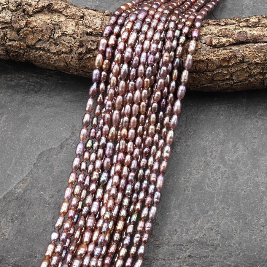 AAA Genuine Natural Metallic Mauve Pink Purple Oval Rice Freshwater Pearl Iridescent High Luster 3x5mm 14.5" Strand