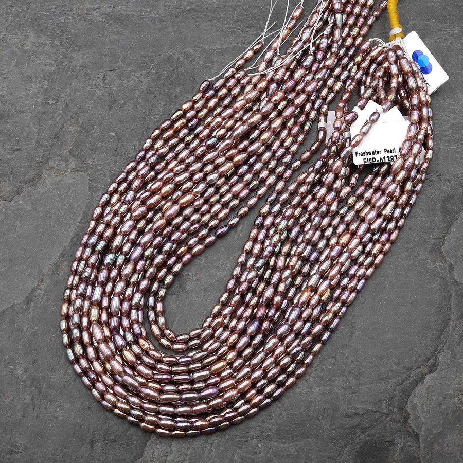 AAA Genuine Natural Metallic Mauve Pink Purple Oval Rice Freshwater Pearl Iridescent High Luster 3x5mm 14.5" Strand