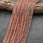 AAA Genuine Natural Metallic Golden Orange Peach Oval Rice Freshwater Pearl Rainbow Iridescence 3x4mm 14.5" Strand