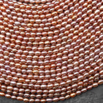 AAA Genuine Natural Metallic Golden Orange Peach Oval Rice Freshwater Pearl Rainbow Iridescence 3x4mm 14.5" Strand