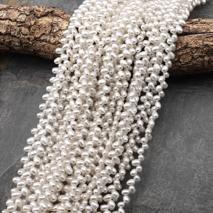Natural White Freshwater Pearl Top Side Diagonally Drilled Leaf Teardrop 6mm Beads 15" Strand