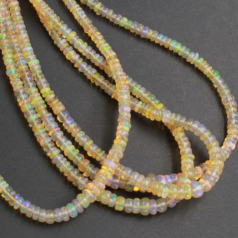 Ethiopian Opal Beads Rondelle Graduating 3mm 4mm AAA Super Flashy Fiery Rainbow Yellow Opal Smooth Rondelle Beads 15.5&quot; Strand A6